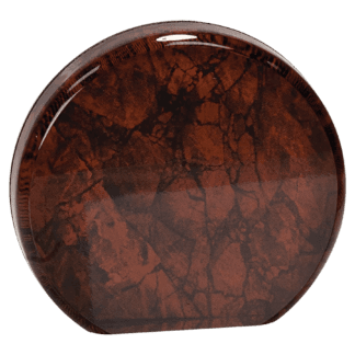 Close-up of a glossy, round wooden surface with a dark brown marbled pattern.