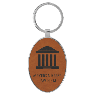 Rawhide Leatherette Oval Keychain with Metal Frame