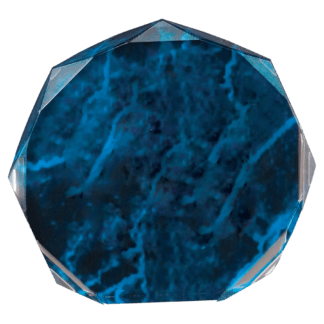 Close-up of a blue faceted gemstone with visible crystal edges and gradient blue interior