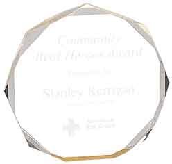Crystal award in a faceted circular frame with faint engraved text unreadable in this image.