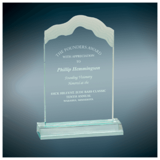 Crystal award trophy with an arched top and etched text recognizing The Founders Award to Phillip Hemmingson, Founding Visionary.