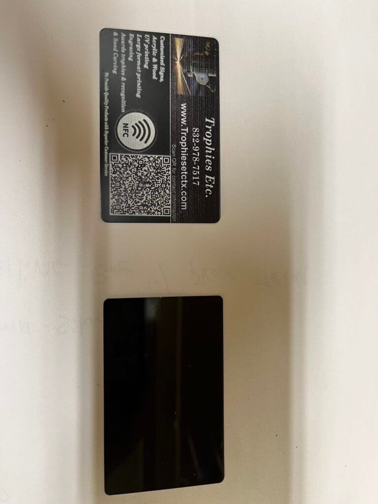 Custom NFC business card with QR code and contact information printed by Trophies Etc. in Baytown, TX.