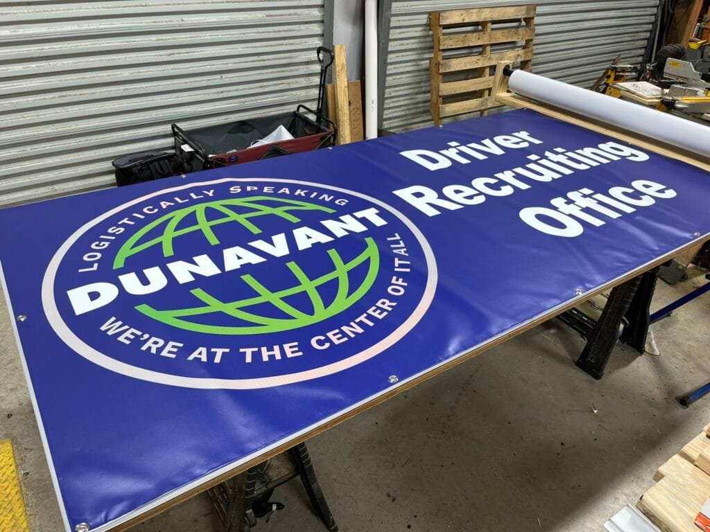 Custom large-format Driver Recruiting Office banner printed by Trophies Etc. for Logistics company using durable outdoor banner material.